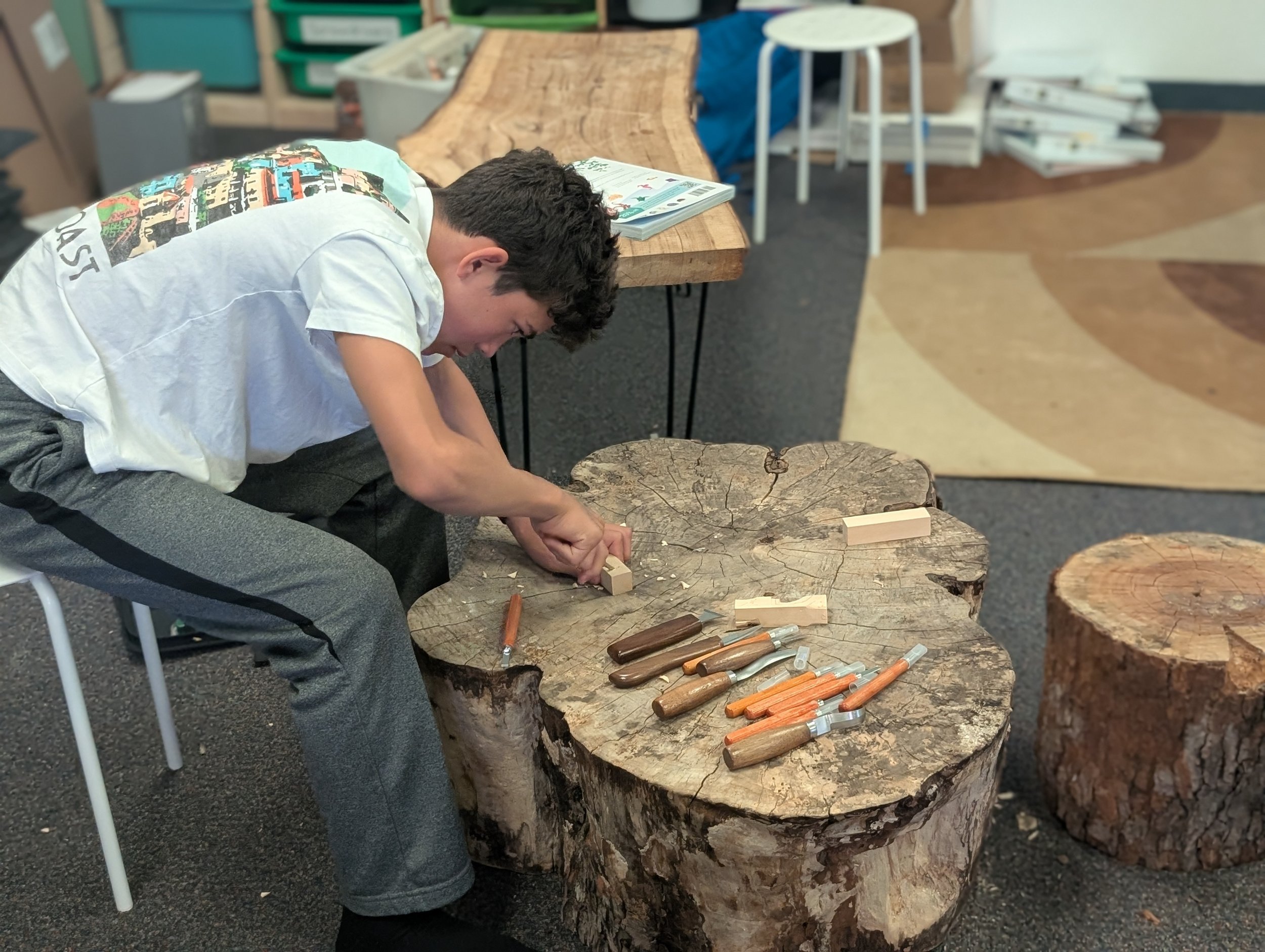 Waldorf-Inspired education: Microschool learners working on woodworking