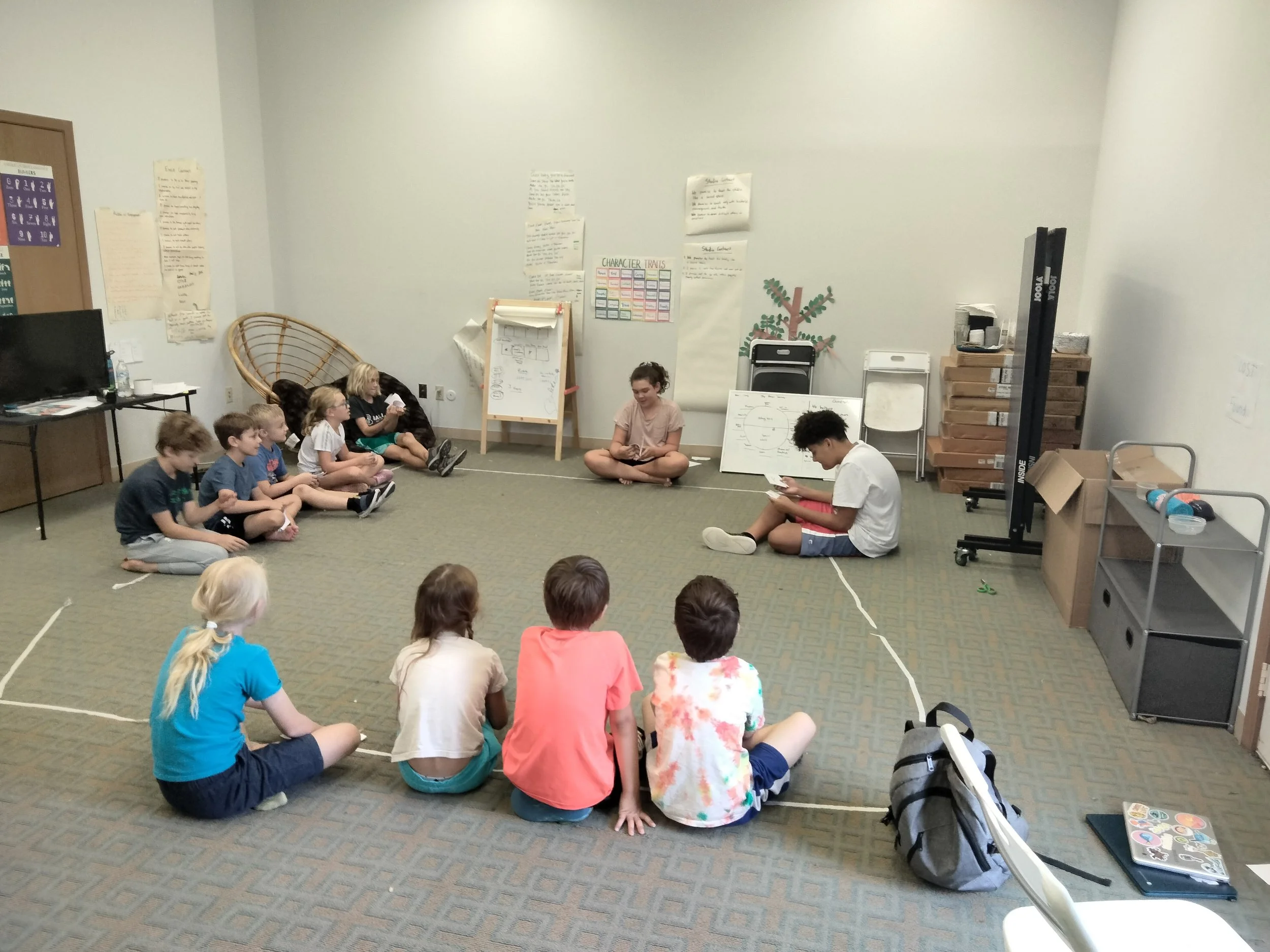 Acton Academy Columbus students sitting in circle