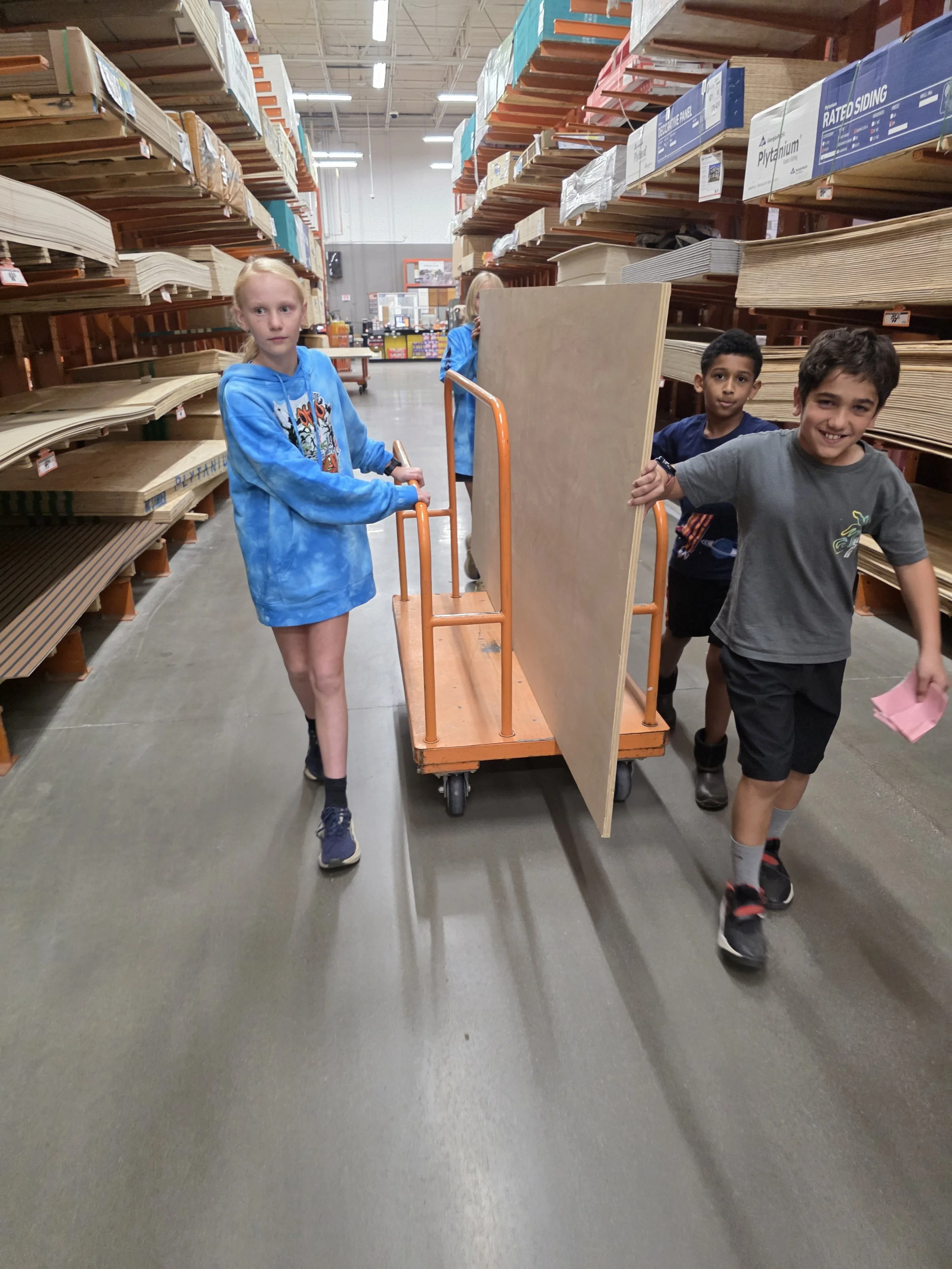 Microschool (Acton Academy) students at Home Depot working on their passion project