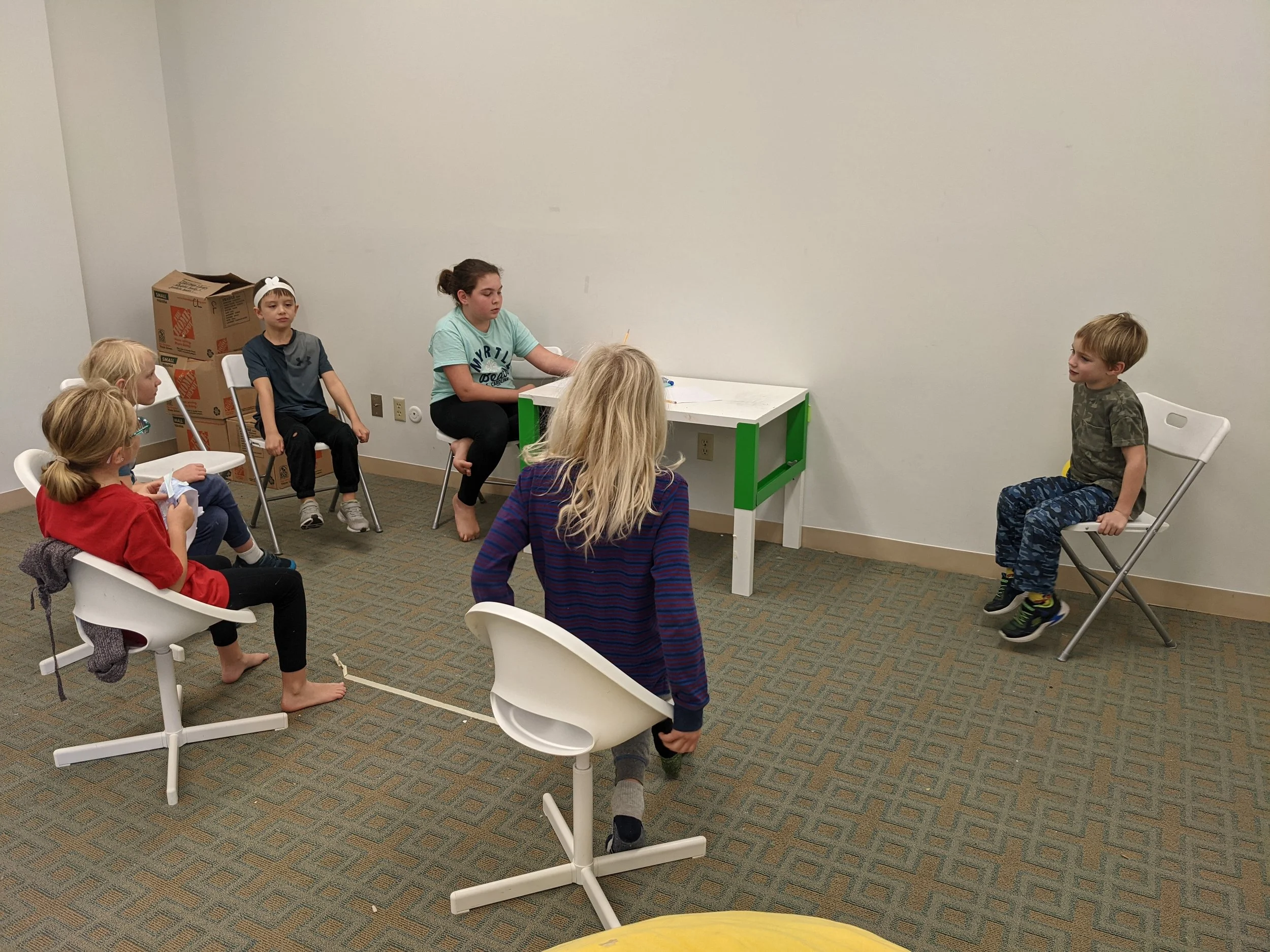 Students having a discussion at a microschool
