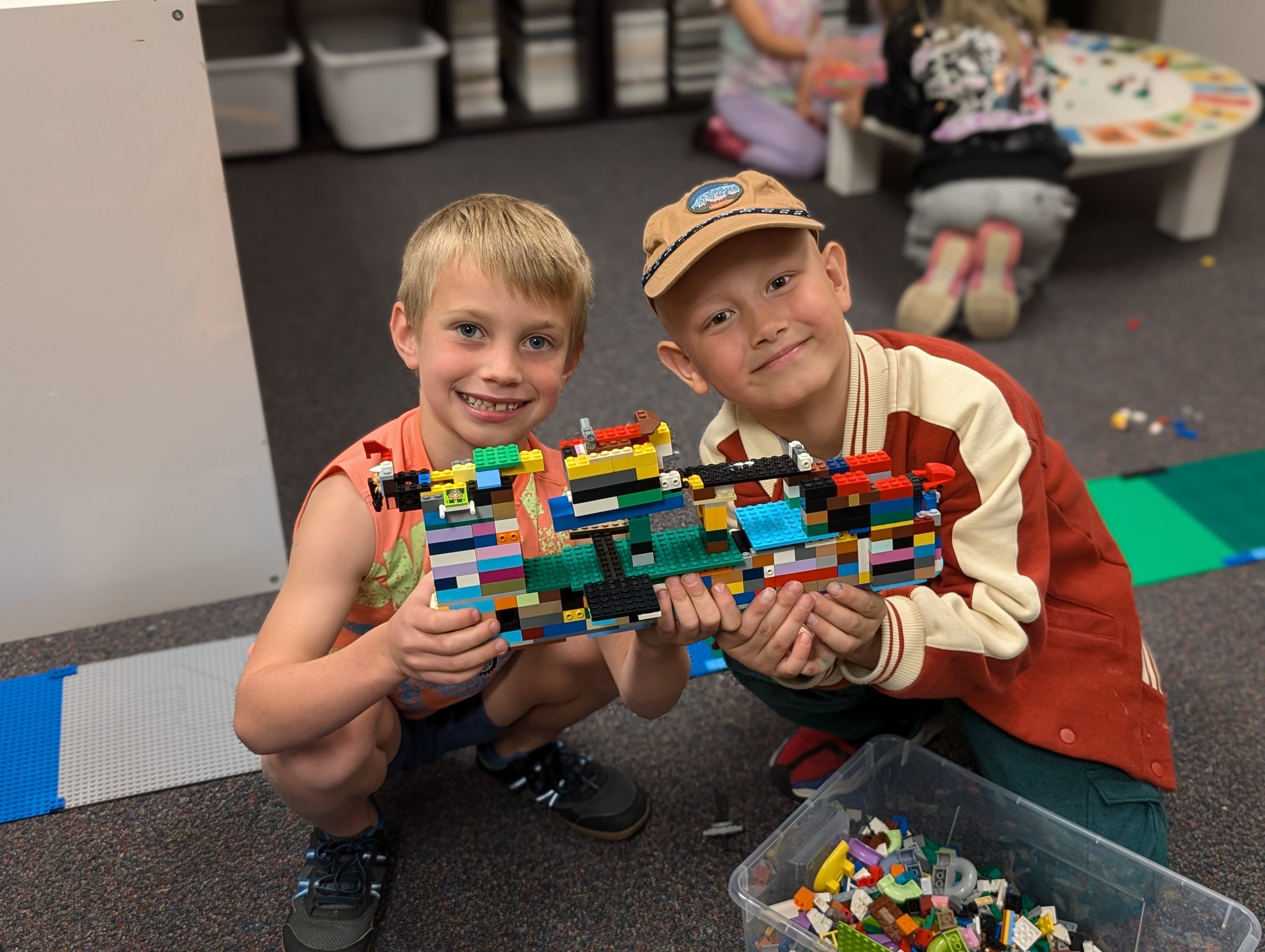 Learners showing a lego build