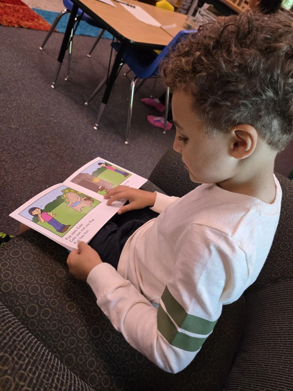 Montessori-Inspired Microschool student learning to read at Acton Academy in Columbus, OH