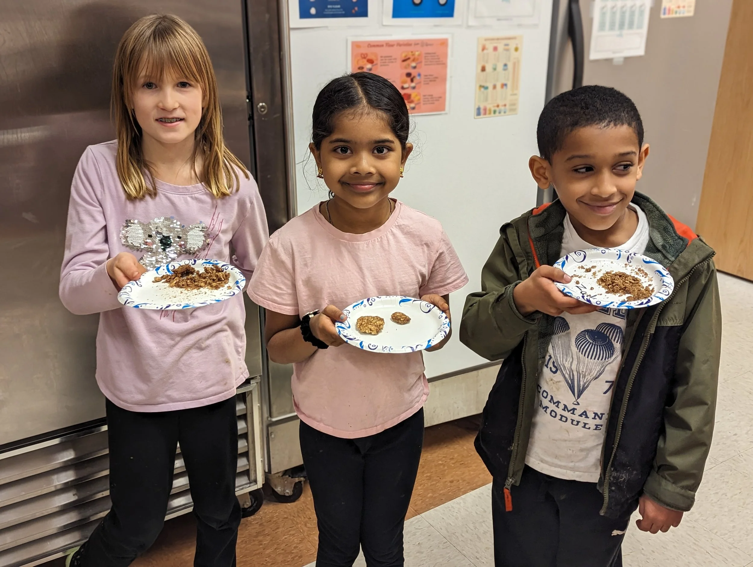 Acton Academy Columbus (microschool in Columbus, OH) students displaying their work during the Baking Quest