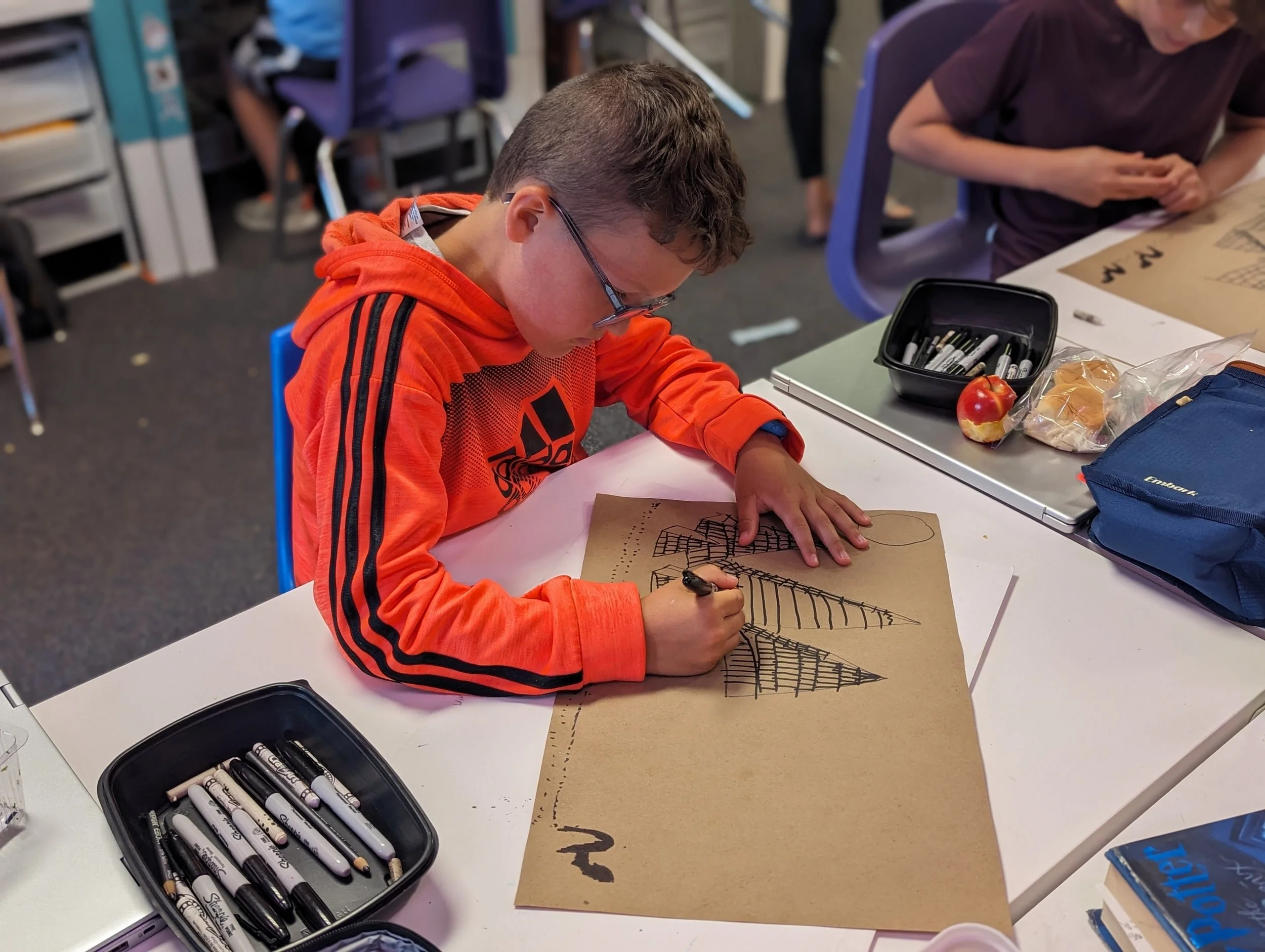 Learner at Acton Acadmey (Alternative School near Hilliard, OH) drawing the pyramids