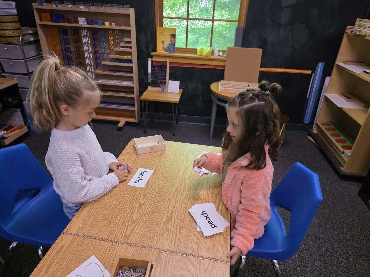 Acton Academy Columbus (Montessori-Inspired Microschool in Dublin, OH) students practicing their reading skills
