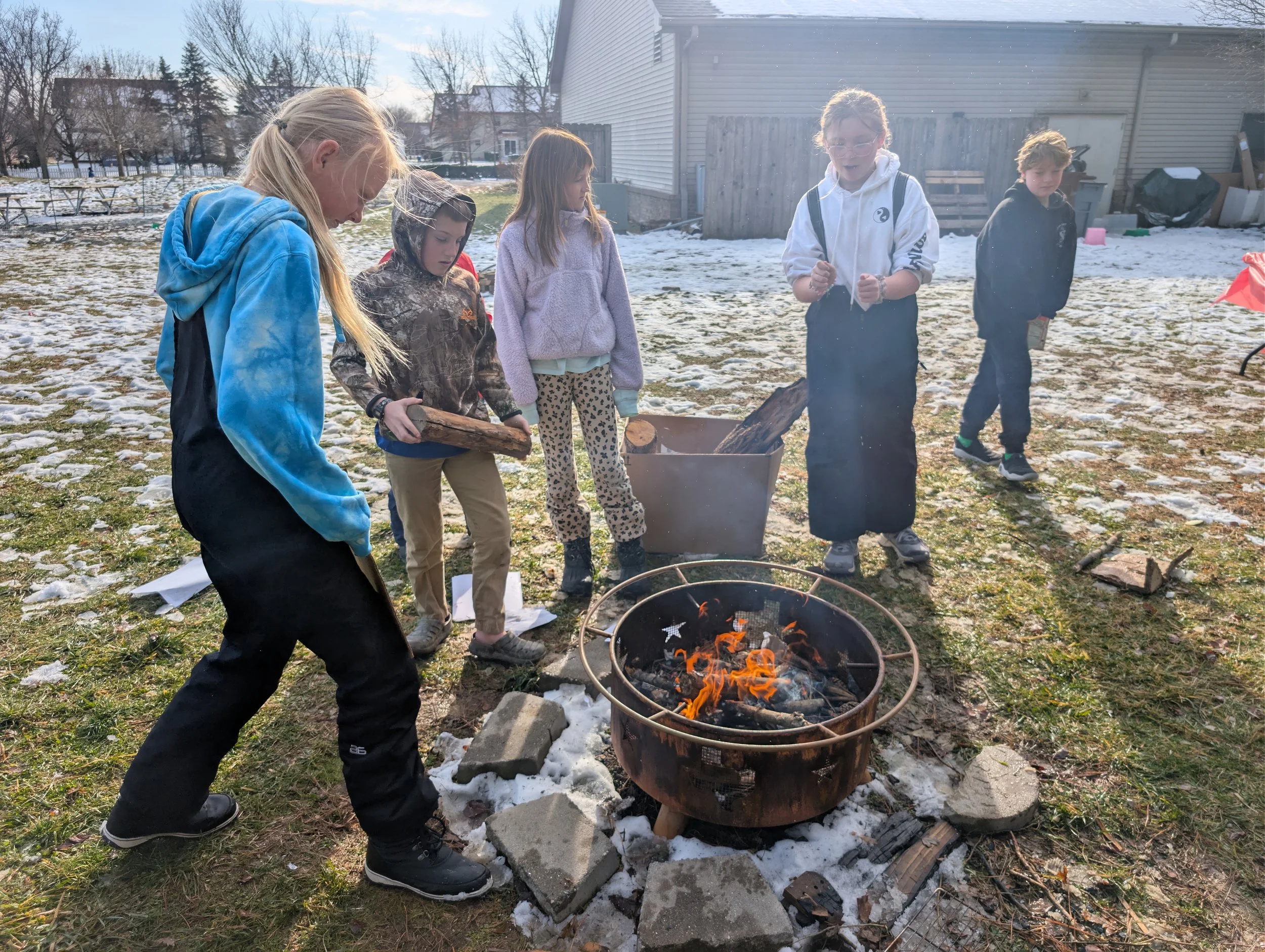Learners engaging in an outdoor challenge at Acton Academy Columbus