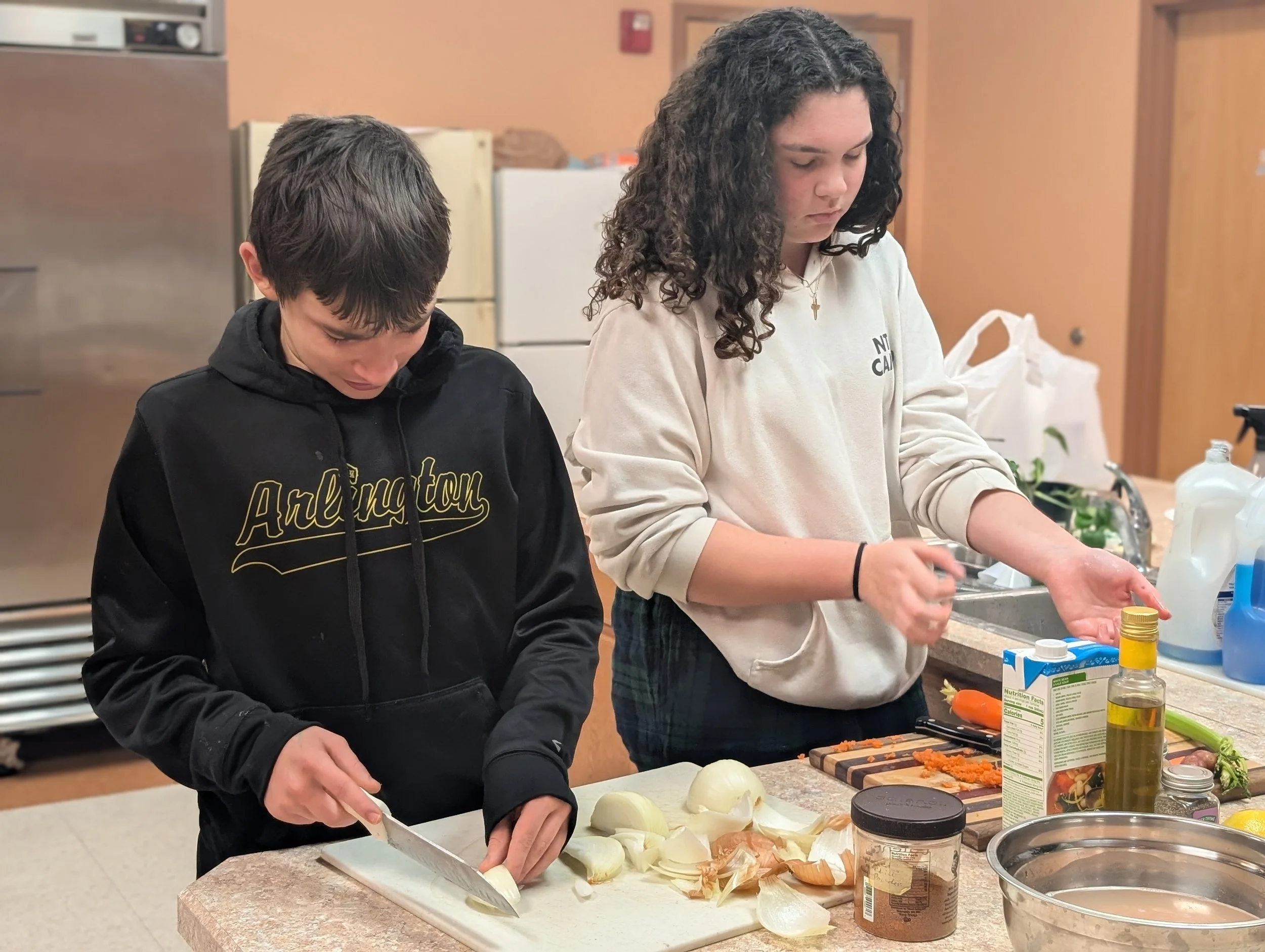 Microschool (Acton Academy Columbus) learners cooking