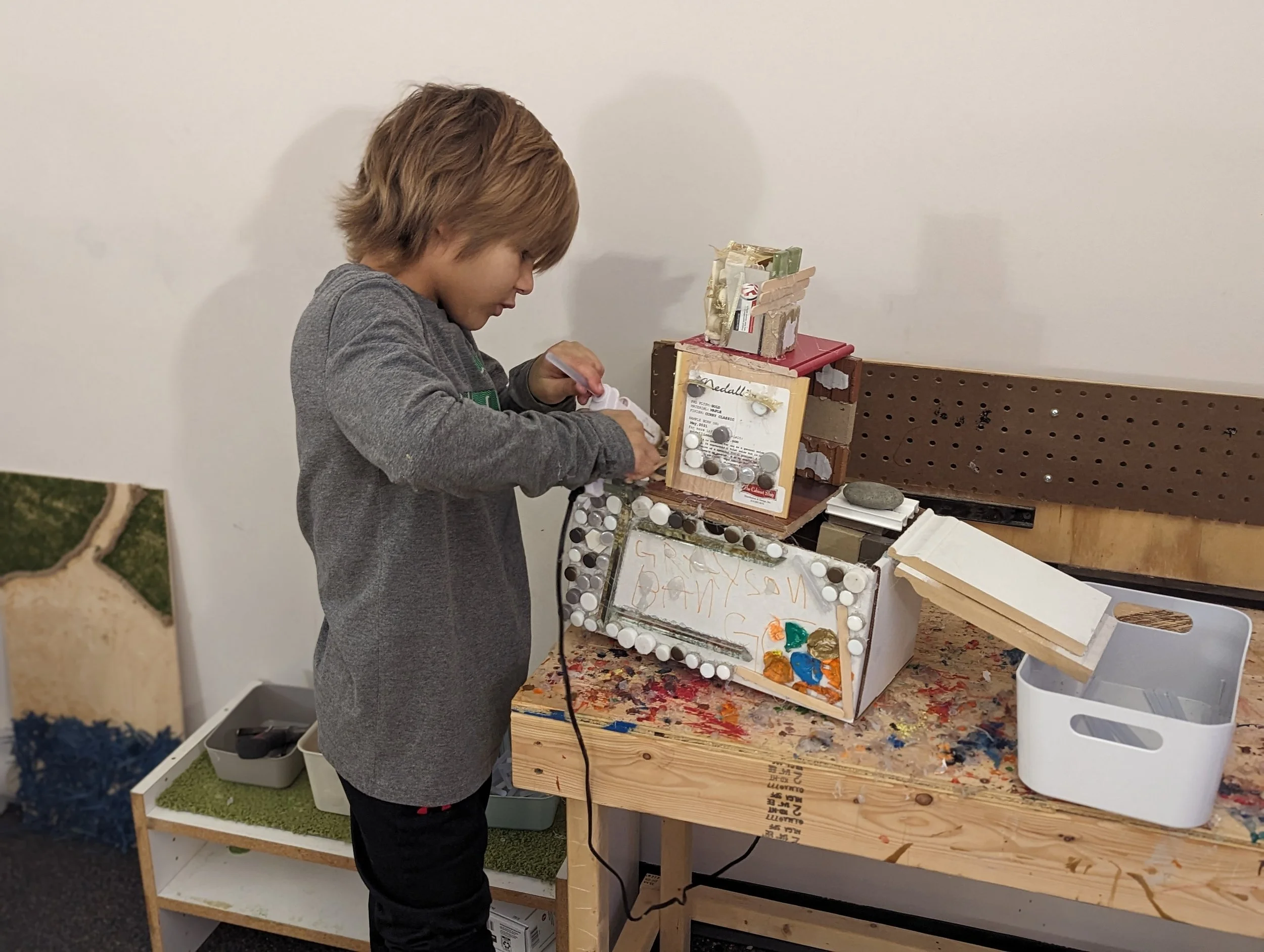 Project Based Learning - Learner at Acton Academy Columbus (microschool in Dublin, OH) building a spaceship
