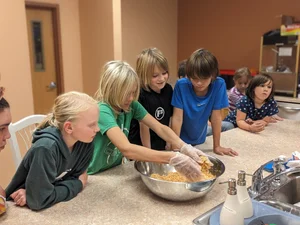 Students baking and studying chemistry